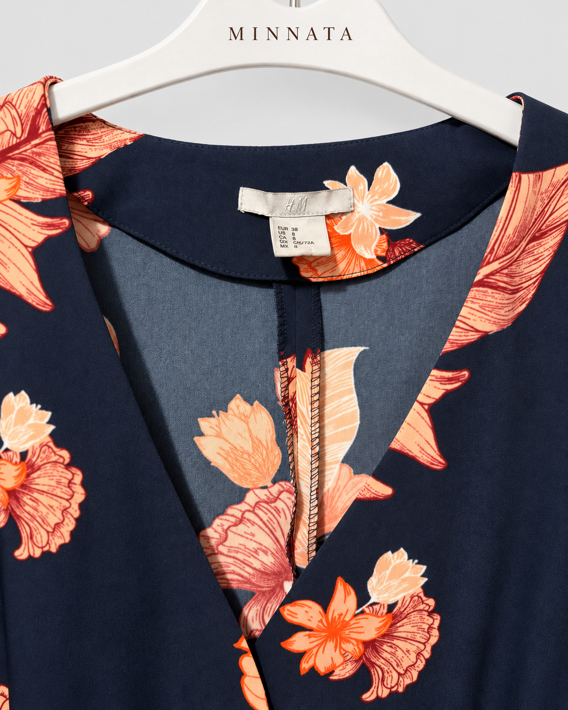Enterito corto floral H&M azul marino con cinturón